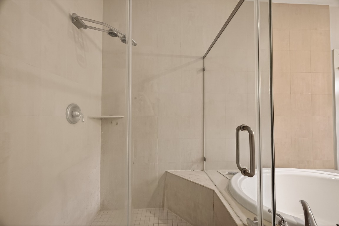 1112 Columbus Street, Unit B Houston, TX 77019 - Photo 25 of 31 a bathroom with a sink and shower