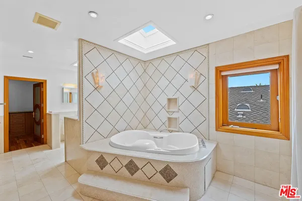 a bathroom with a toilet and a sink