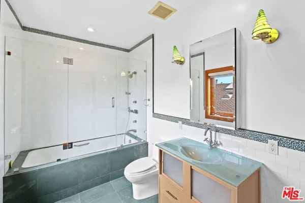 a house view with a sitting space and garden view