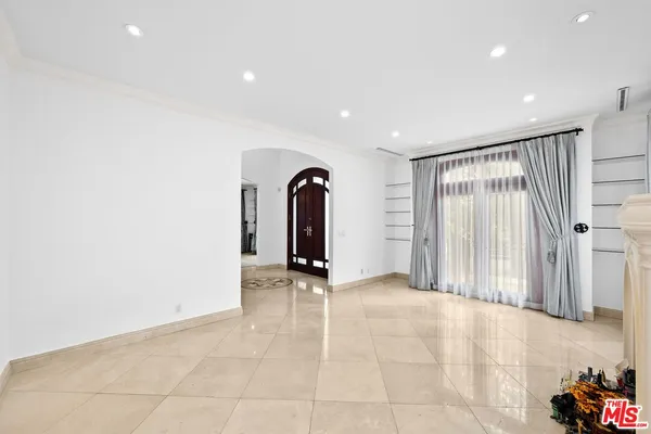 a view of a livingroom with a staircase