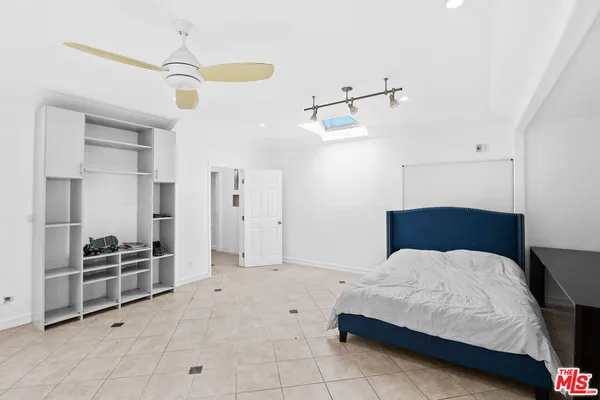 a view of a backyard with sitting area