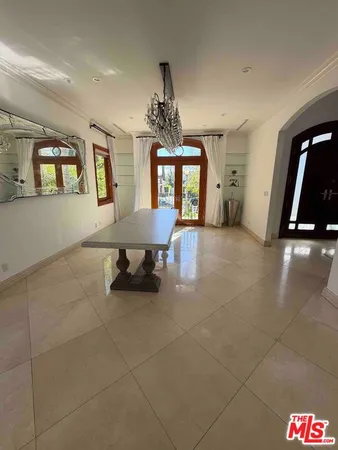 a view of a livingroom with furniture and window