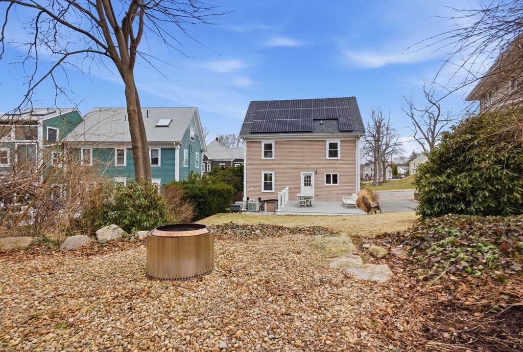 5 Pickett Street Beverly, MA 01915 - Photo 18 of 30 a view of a house with a yard