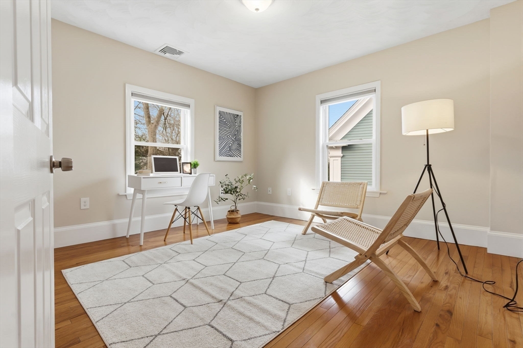 5 Pickett Street Beverly, MA 01915 - Photo 9 of 30 a living room with furniture and a table