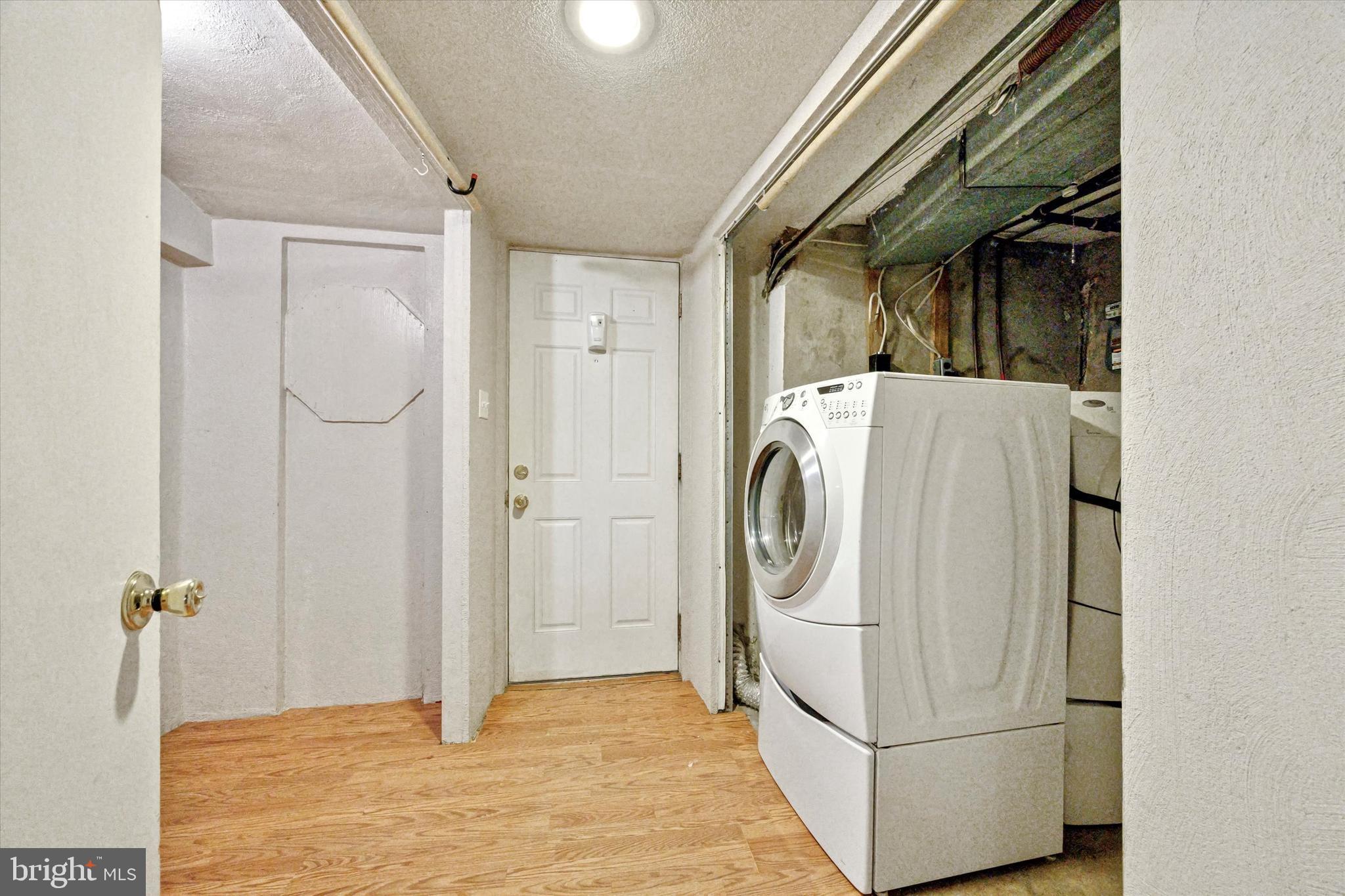 547 Overlook Road Philadelphia, PA 19128 - Photo 22 of 24 a utility room with dryer and washer