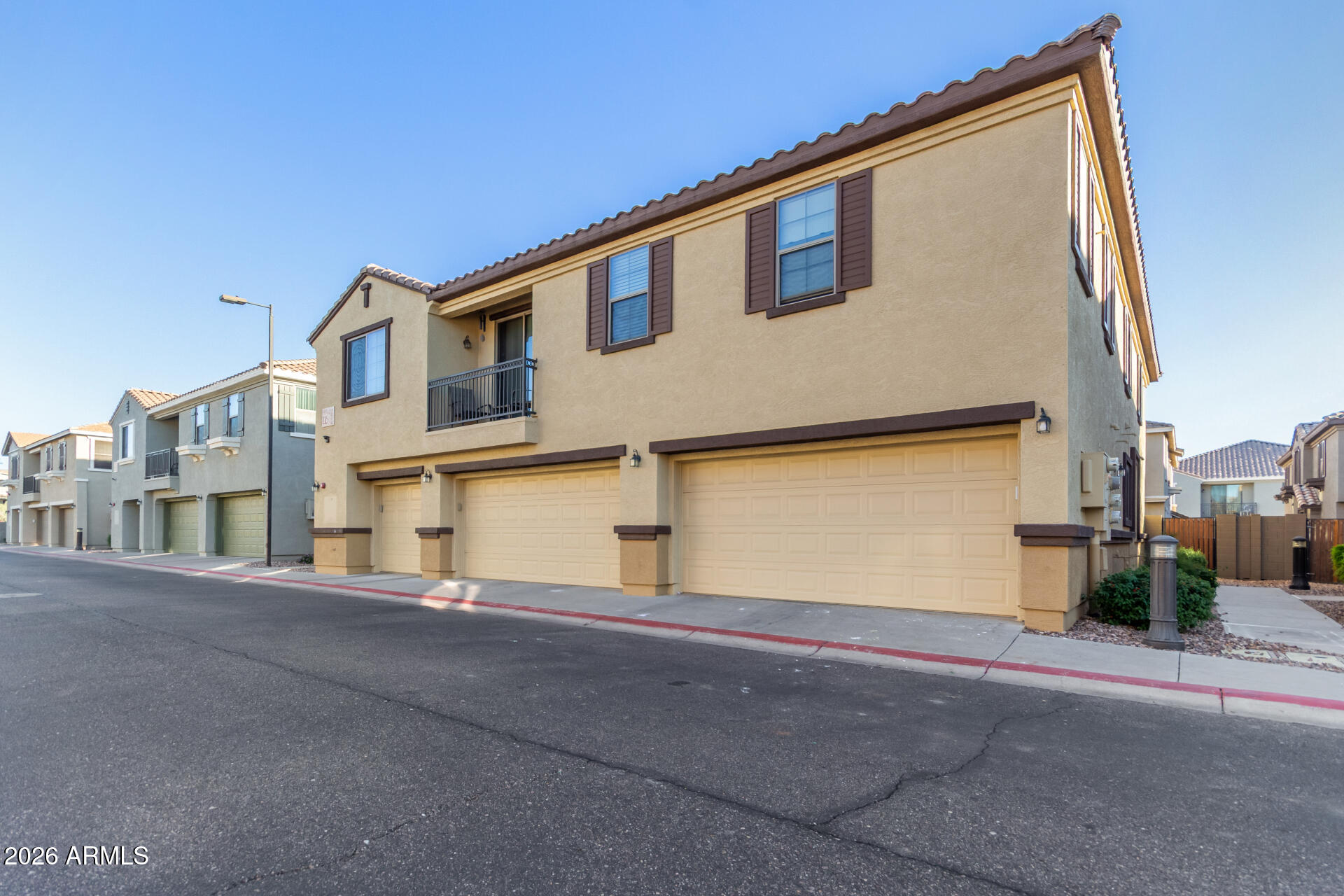 1265 South Aaron, Unit 346 Mesa, AZ 85209 - Photo 27 of 34 a view of a house with a street