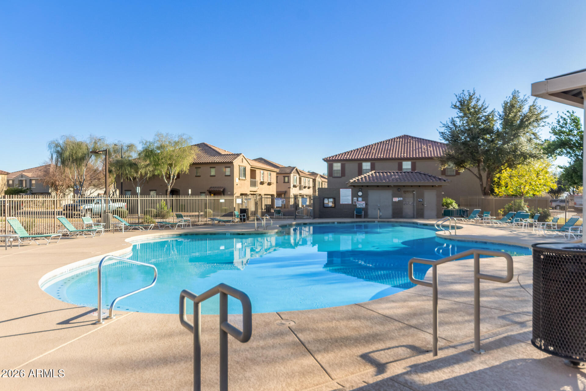 1265 South Aaron, Unit 346 Mesa, AZ 85209 - Photo 30 of 34 a swimming pool with outdoor seating and yard