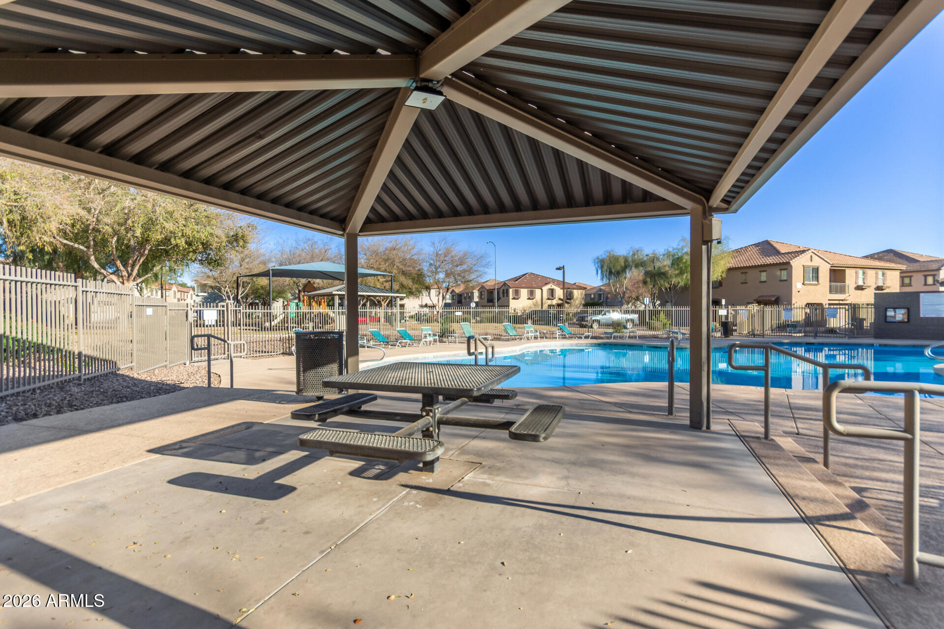 1265 South Aaron, Unit 346 Mesa, AZ 85209 - Photo 31 of 34 a room with lots of table and chairs