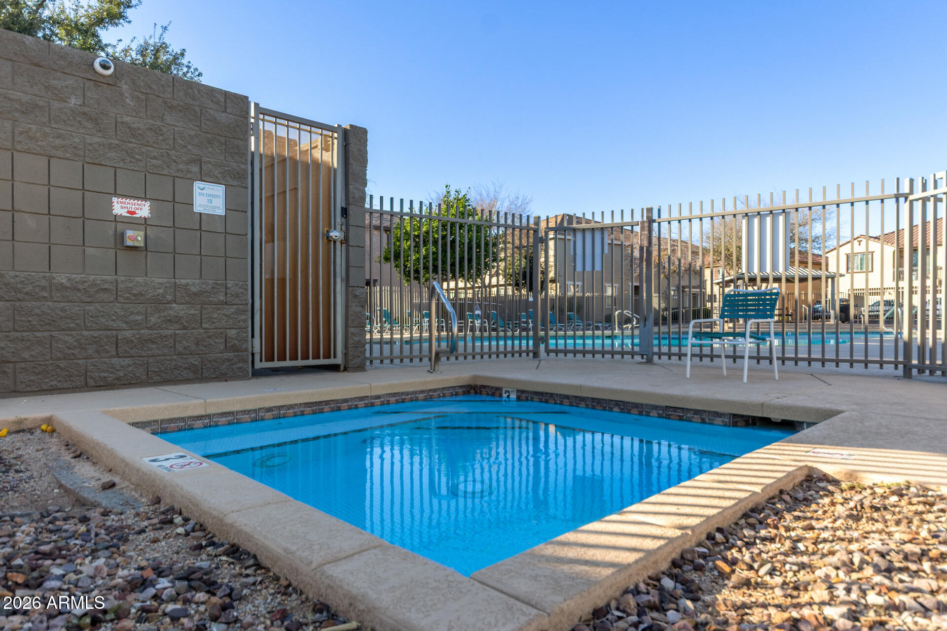 1265 South Aaron, Unit 346 Mesa, AZ 85209 - Photo 33 of 34 a view of a swimming pool with a patio