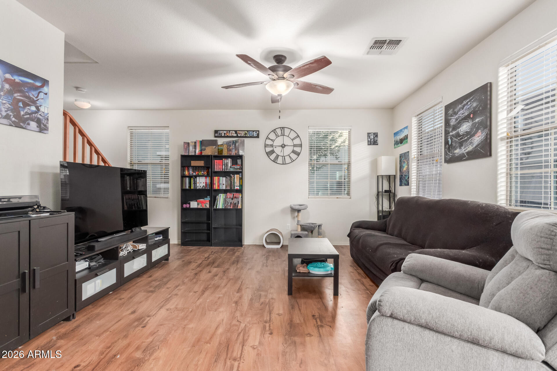 1265 South Aaron, Unit 346 Mesa, AZ 85209 - Photo 6 of 34 a living room with furniture and a flat screen tv