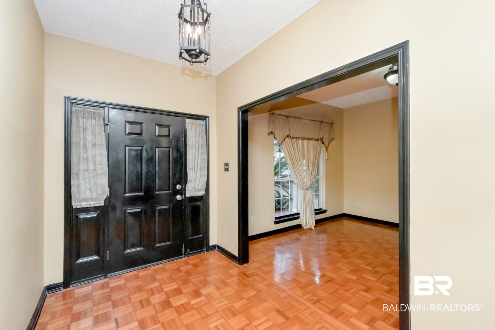 152 Ideal Avenue Mobile, AL 36608 - Photo 2 of 32 Entrance foyer with parquet floors and a textured ceiling