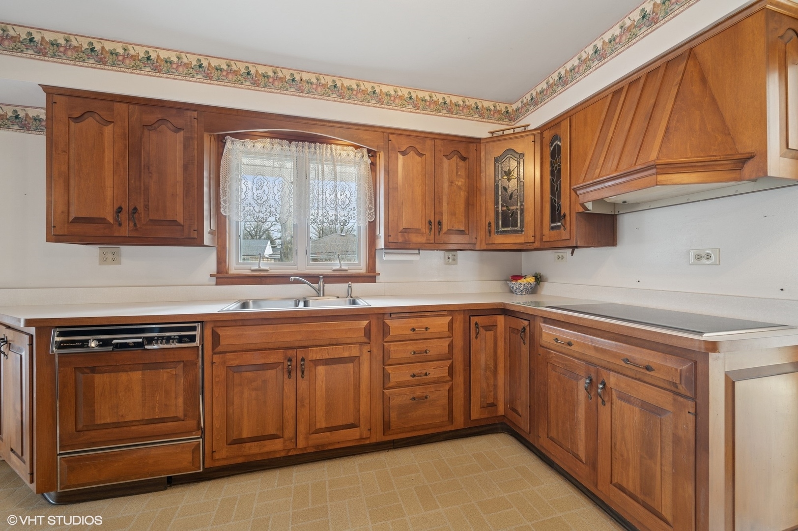 213 North Forest Avenue Mount Prospect, IL 60056 - Photo 5 of 18 a kitchen with sink cabinets and window