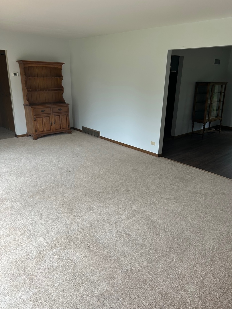 1125 Morningside Drive Elgin, IL 60123 - Photo 29 of 42 a view of an empty room and wooden floor