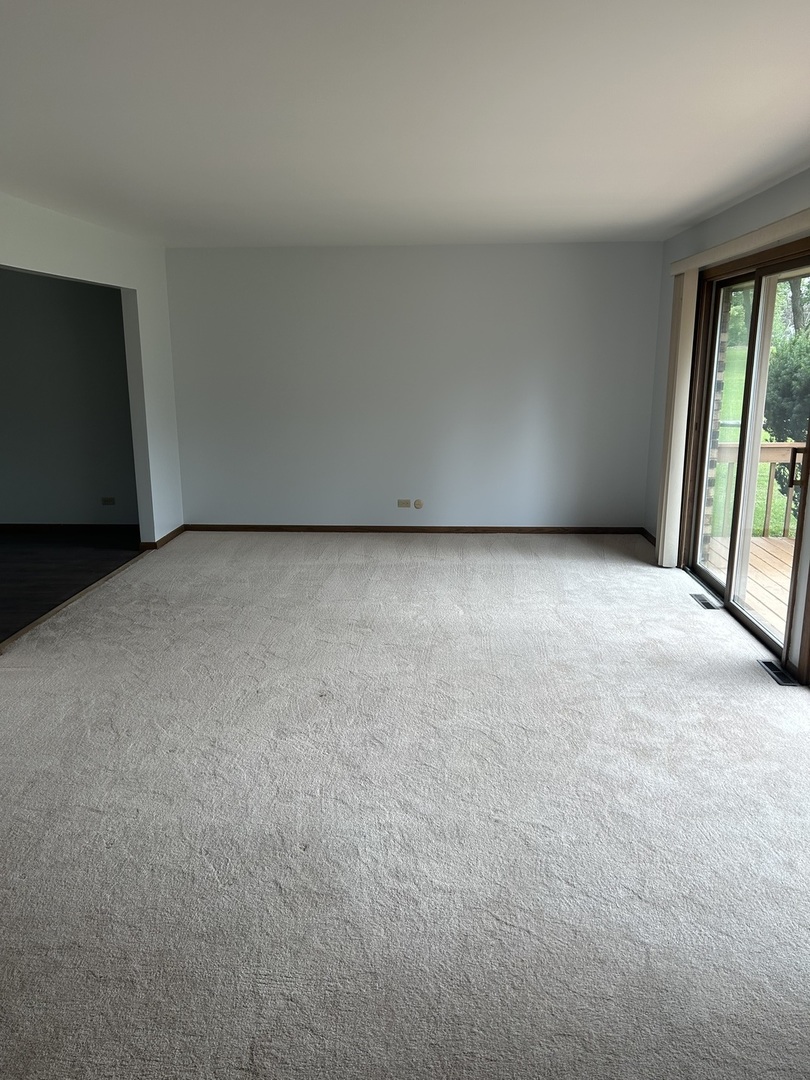 1125 Morningside Drive Elgin, IL 60123 - Photo 30 of 42 a view of an empty room with a fireplace
