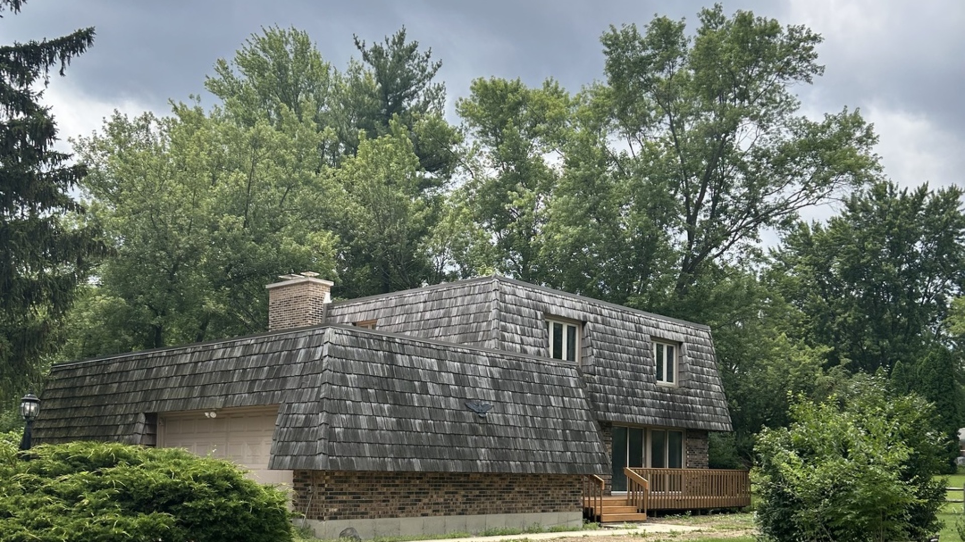 1125 Morningside Drive Elgin, IL 60123 - Photo 36 of 42 a front view of a house with trees