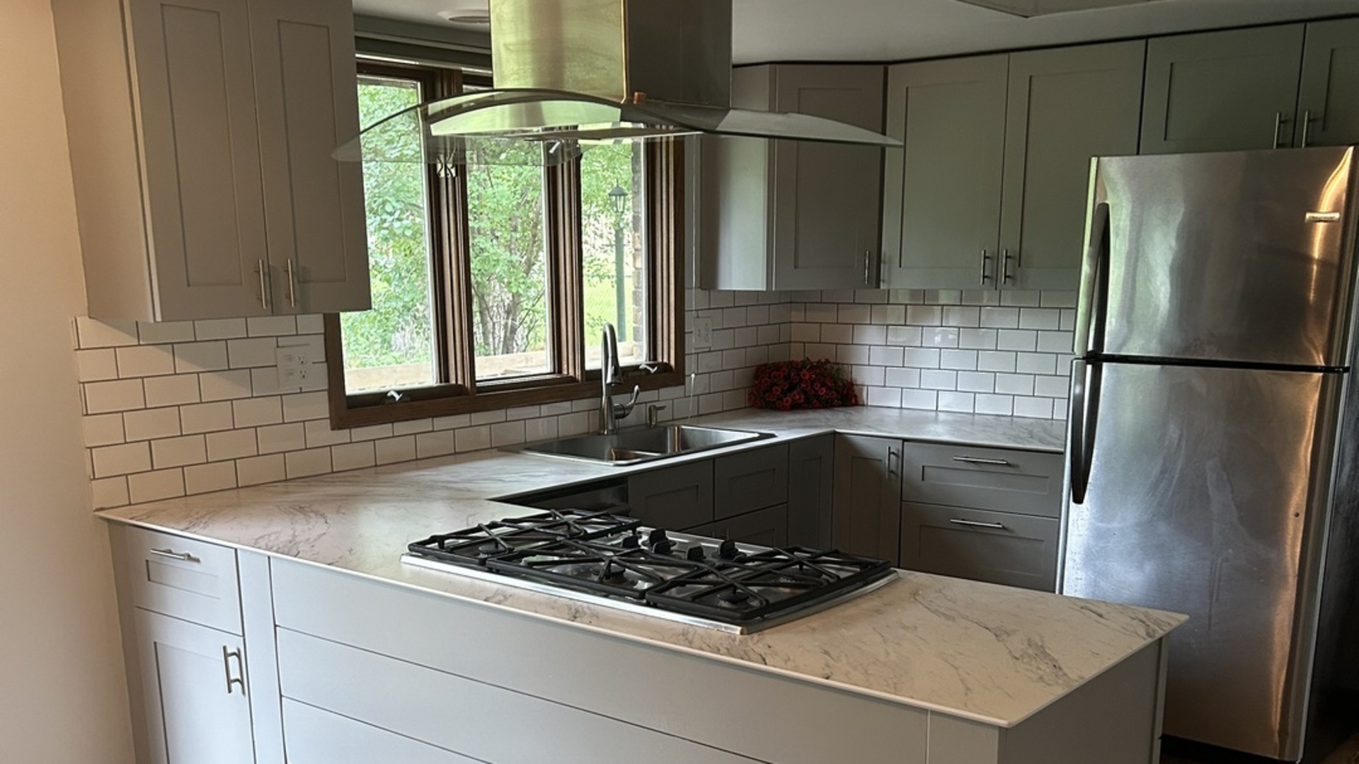 1125 Morningside Drive Elgin, IL 60123 - Photo 10 of 42 a kitchen with a refrigerator and a stove