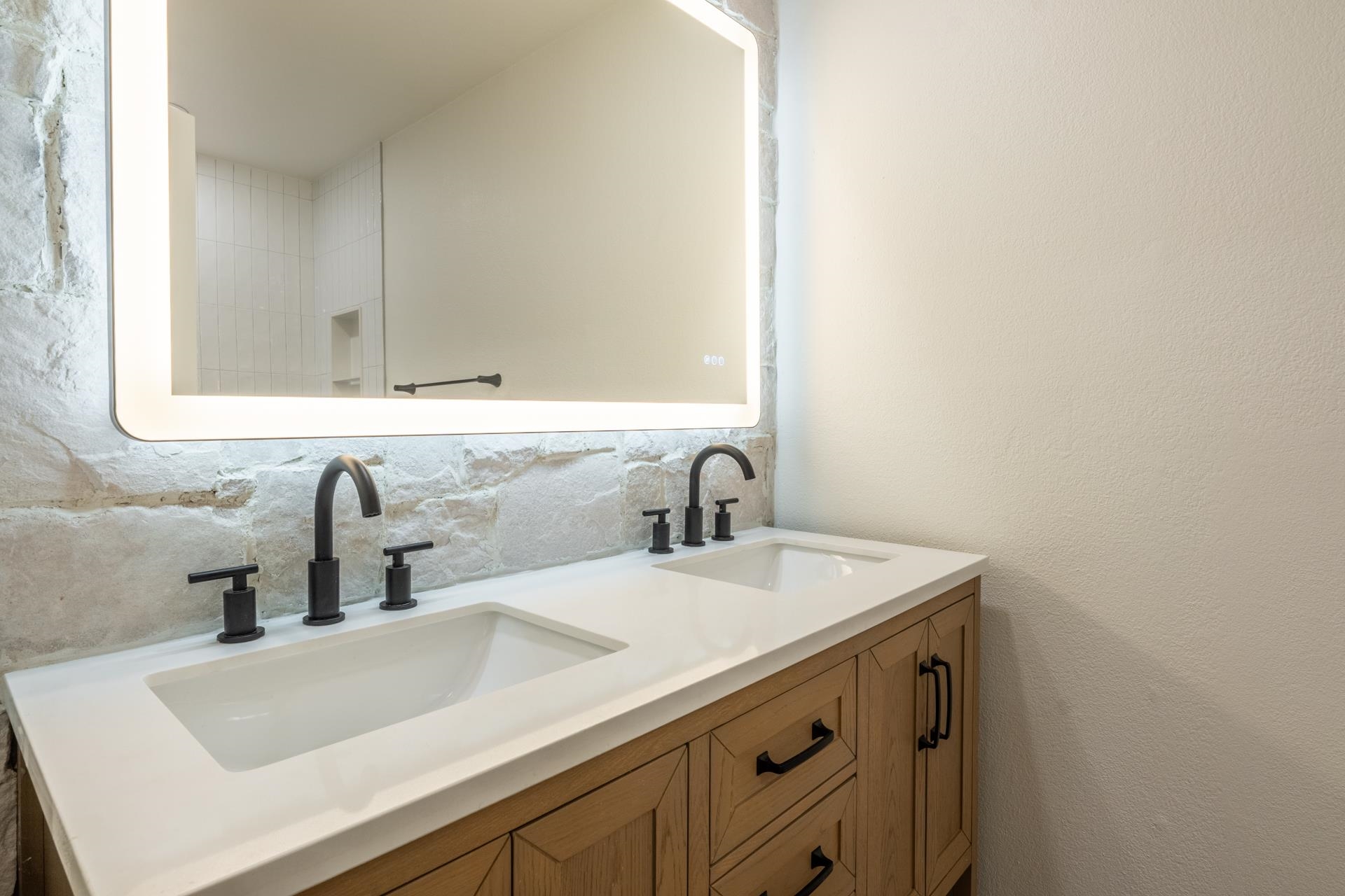 235 Forest Trail Mammoth Lakes, CA 93546 - Photo 23 of 35 Bathroom with backsplash and double vanity