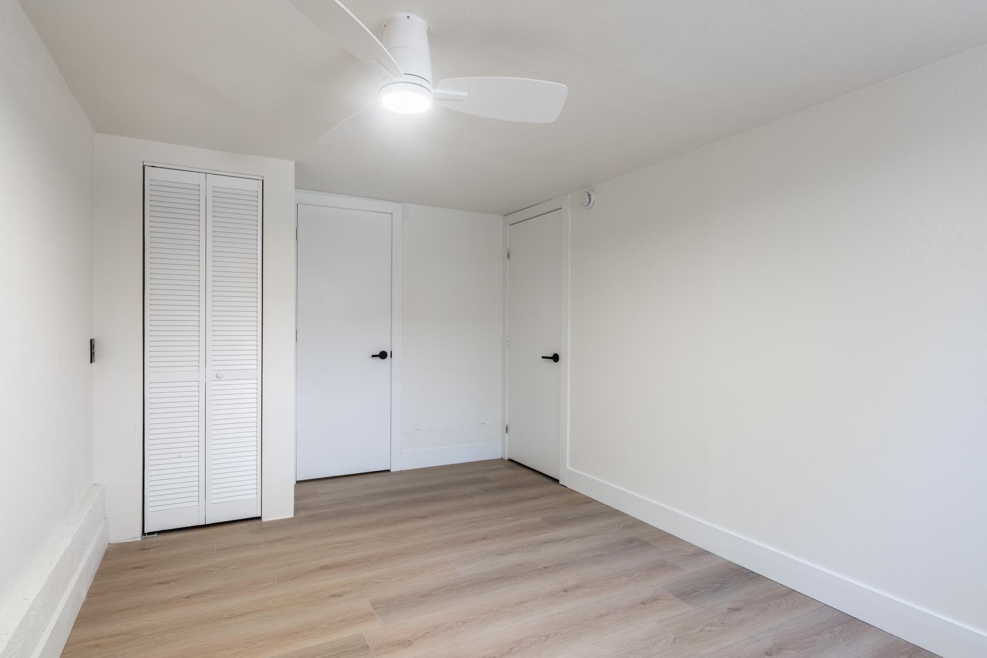 235 Forest Trail Mammoth Lakes, CA 93546 - Photo 28 of 35 Unfurnished bedroom featuring light wood-style flooring, a closet, and ceiling fan