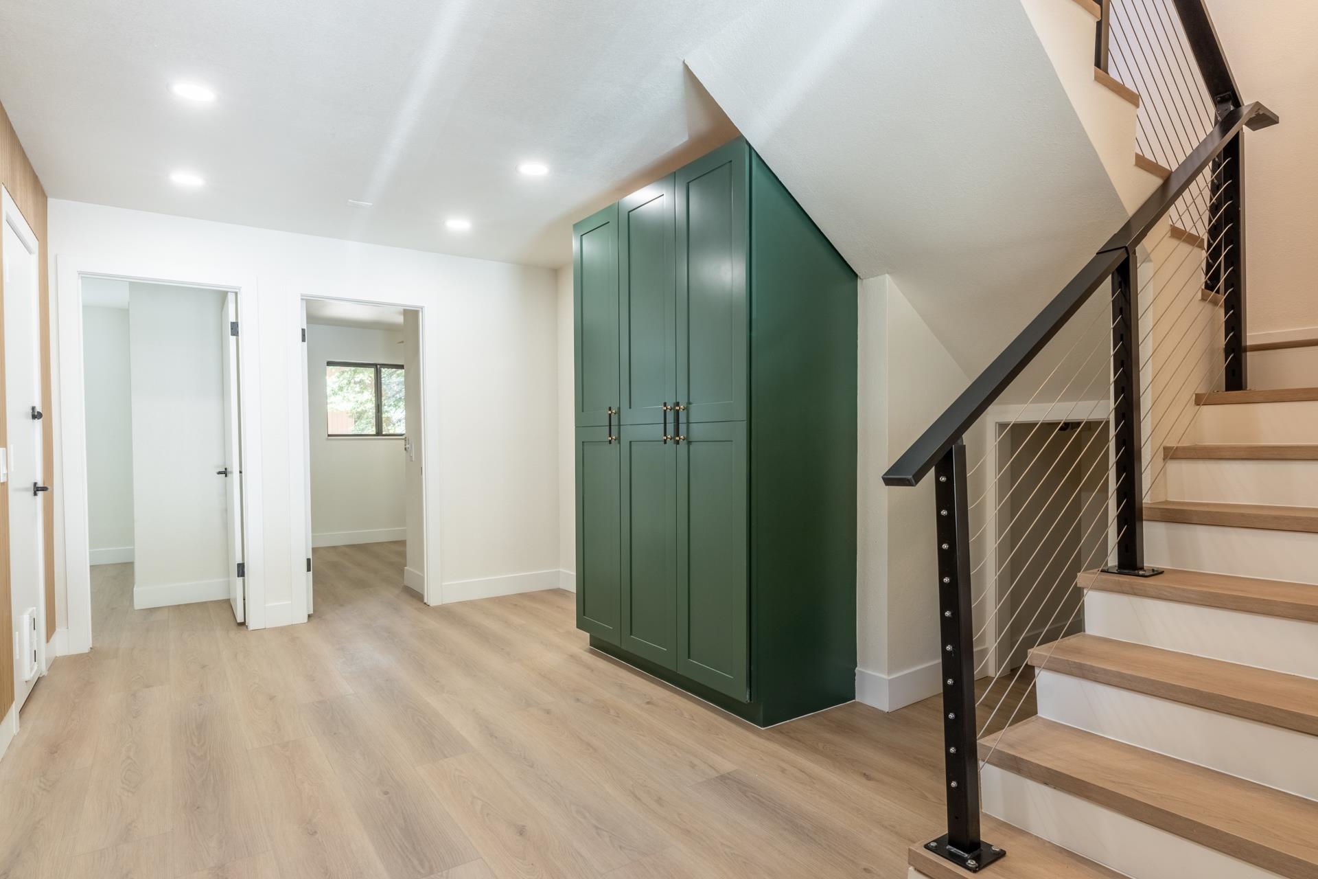 235 Forest Trail Mammoth Lakes, CA 93546 - Photo 5 of 35 Stairway with wood finished floors and recessed lighting
