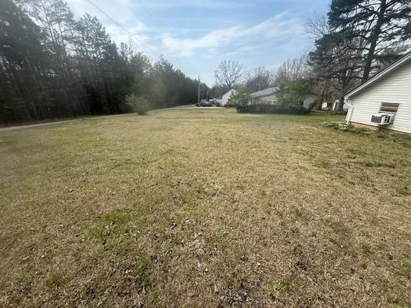 a view of an outdoor space and a yard