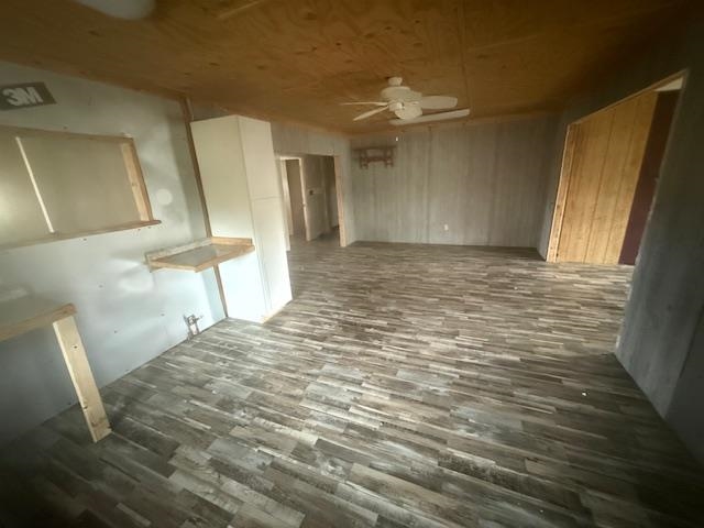 2310 Feddie Davis Road Ramer, TN 38367 - Photo 13 of 38 Unfurnished dining area with dark wood-style floors and a ceiling fan