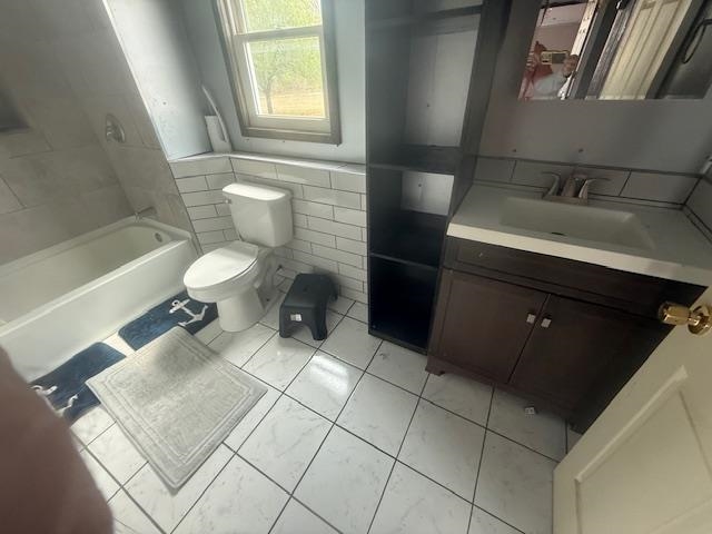2310 Feddie Davis Road Ramer, TN 38367 - Photo 34 of 38 Bathroom featuring tile walls and vanity