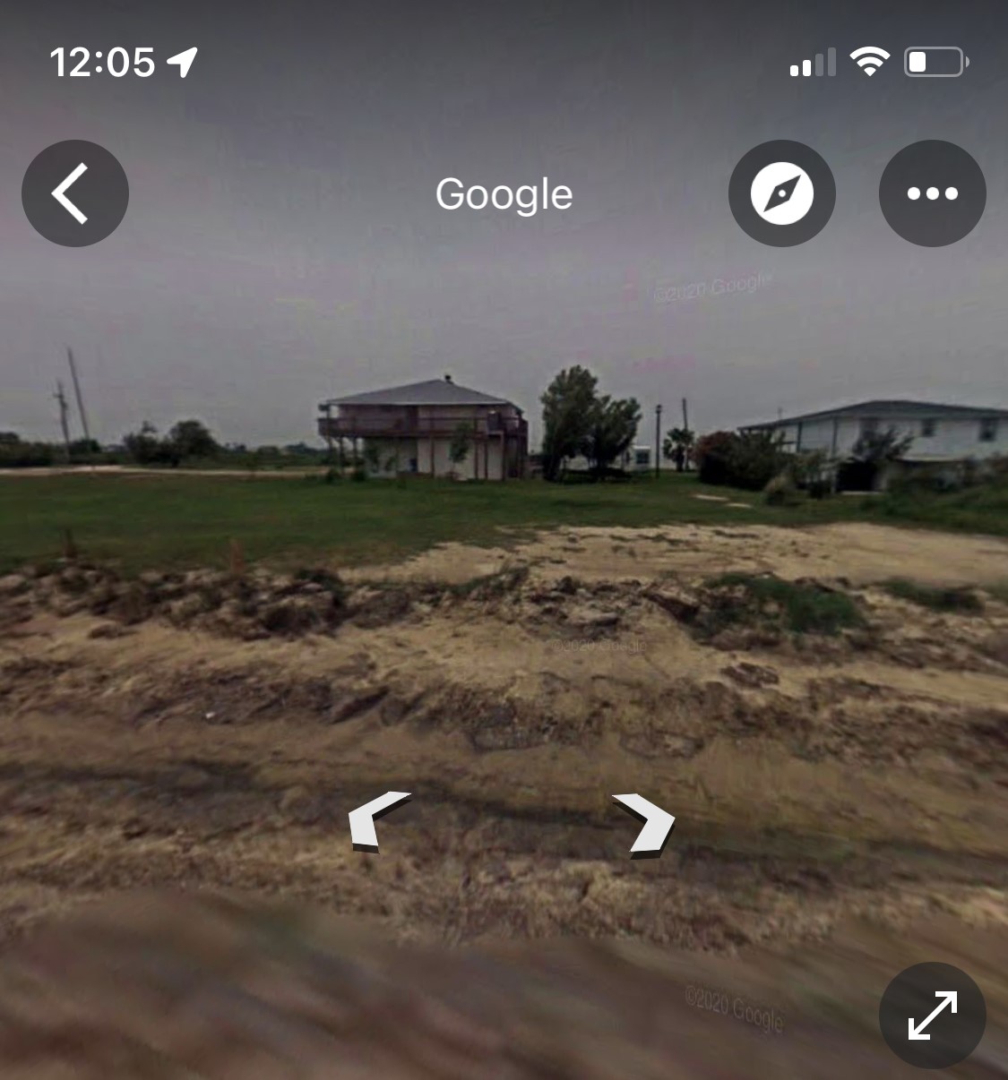 1116 Gulf Supply Road Port Bolivar, TX 77650 - Photo 9 of 9 a view of a street with a building and trees in the background