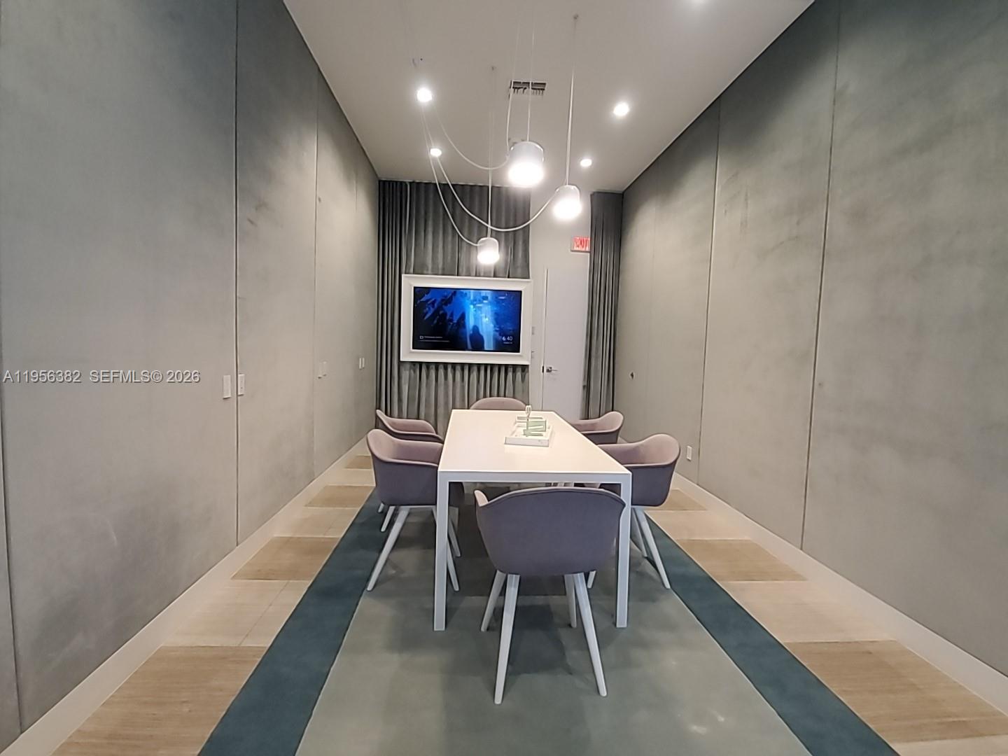 2000 Metropica Way, Unit 412 Sunrise, FL 33323 - Photo 18 of 18 a view of a dining room with furniture