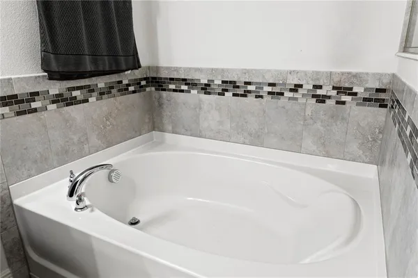 a bathroom with a bathtub