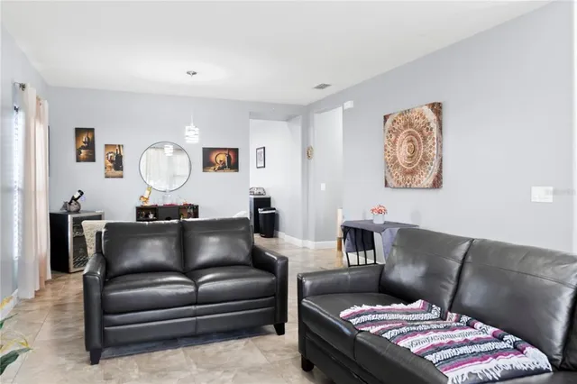 a living room with furniture and a couch