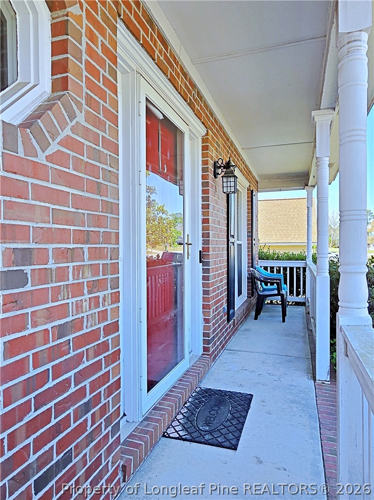 5218 Pringle Way Hope Mills, NC 28348 - Photo 37 of 43 a view of a brick building with many windows