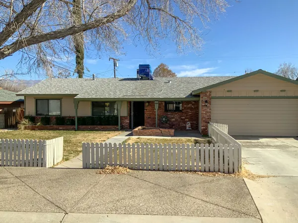 a front view of a house with a porch