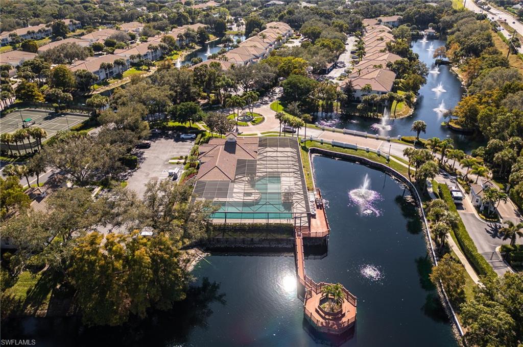 6927 Satinleaf Road North, Unit 203 Naples, FL 34109 - Photo 37 of 39 Bird's eye view of a nearby body of water