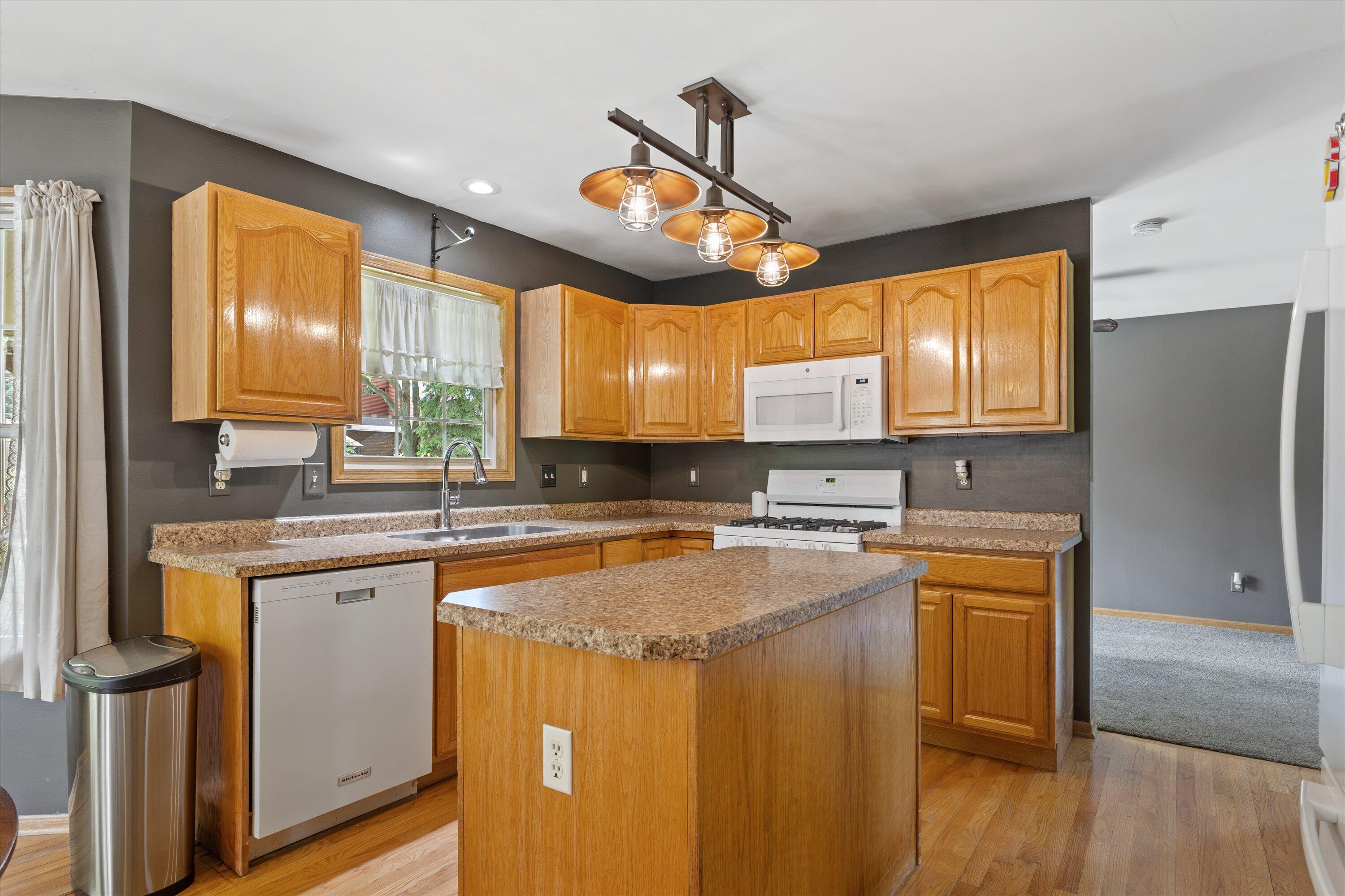 3330 Wood Road Mount Pleasant, WI 53406 - Photo 11 of 46 Open Kitchen w/ island