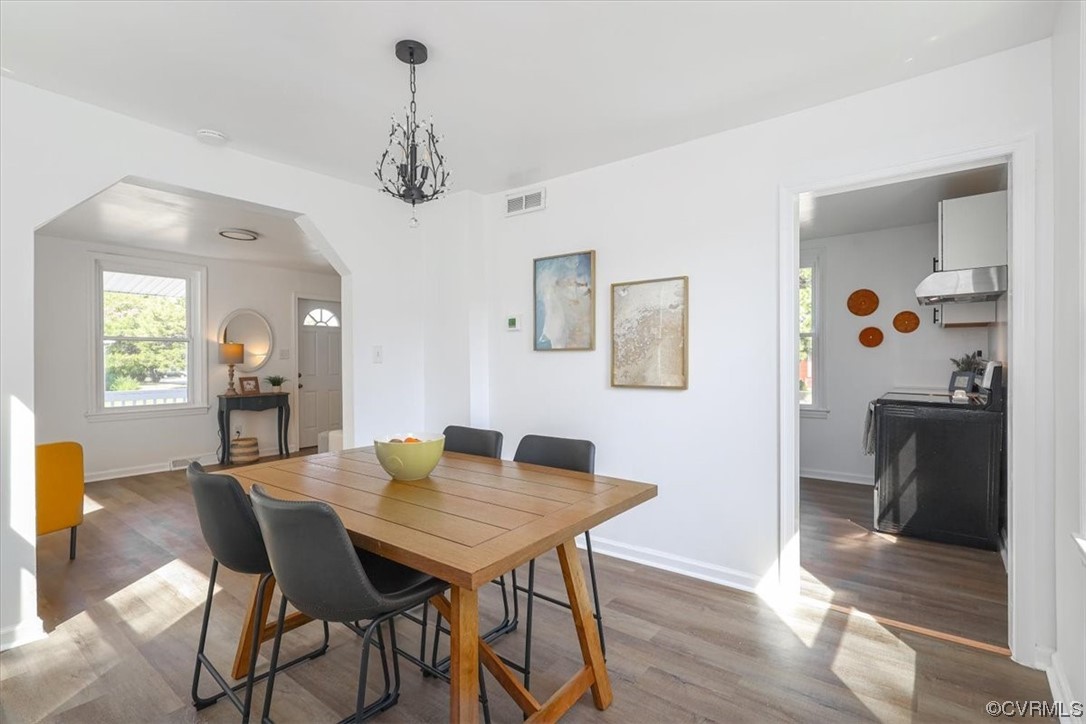 1006 Haskell Street Hopewell, VA 23860 - Photo 15 of 48 a view of a dining room with furniture and wooden floor