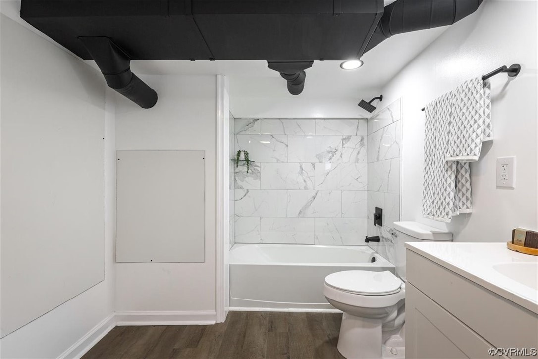 1006 Haskell Street Hopewell, VA 23860 - Photo 27 of 48 a bathroom with a toilet a sink and a bathtub