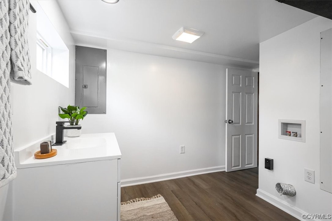 1006 Haskell Street Hopewell, VA 23860 - Photo 28 of 48 a bathroom with a sink and a mirror