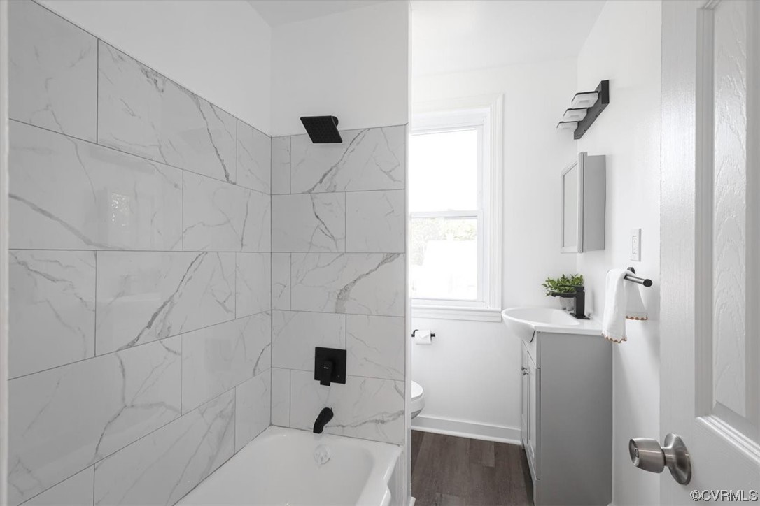1006 Haskell Street Hopewell, VA 23860 - Photo 33 of 48 a bathroom with a sink toilet and shower