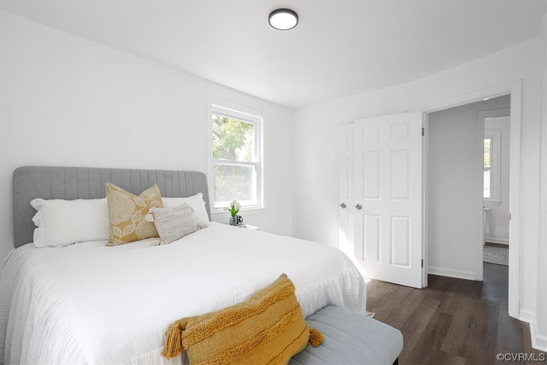 1006 Haskell Street Hopewell, VA 23860 - Photo 40 of 48 a bedroom with a bed and wooden floor