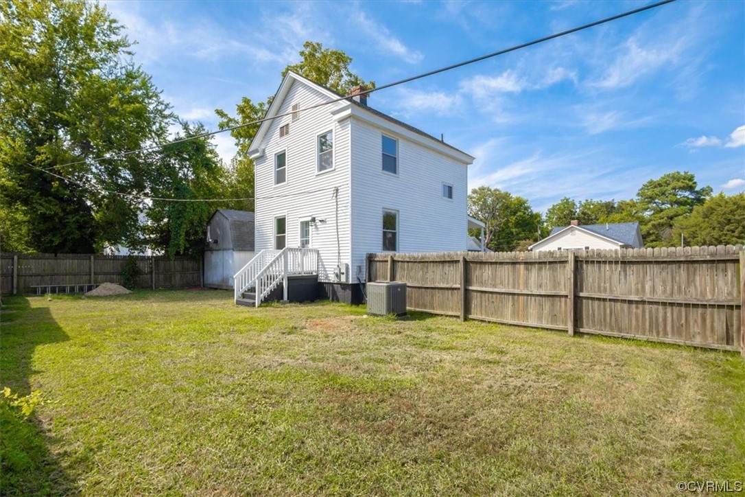 1006 Haskell Street Hopewell, VA 23860 - Photo 4 of 48 a view of a house with backyard and sitting area