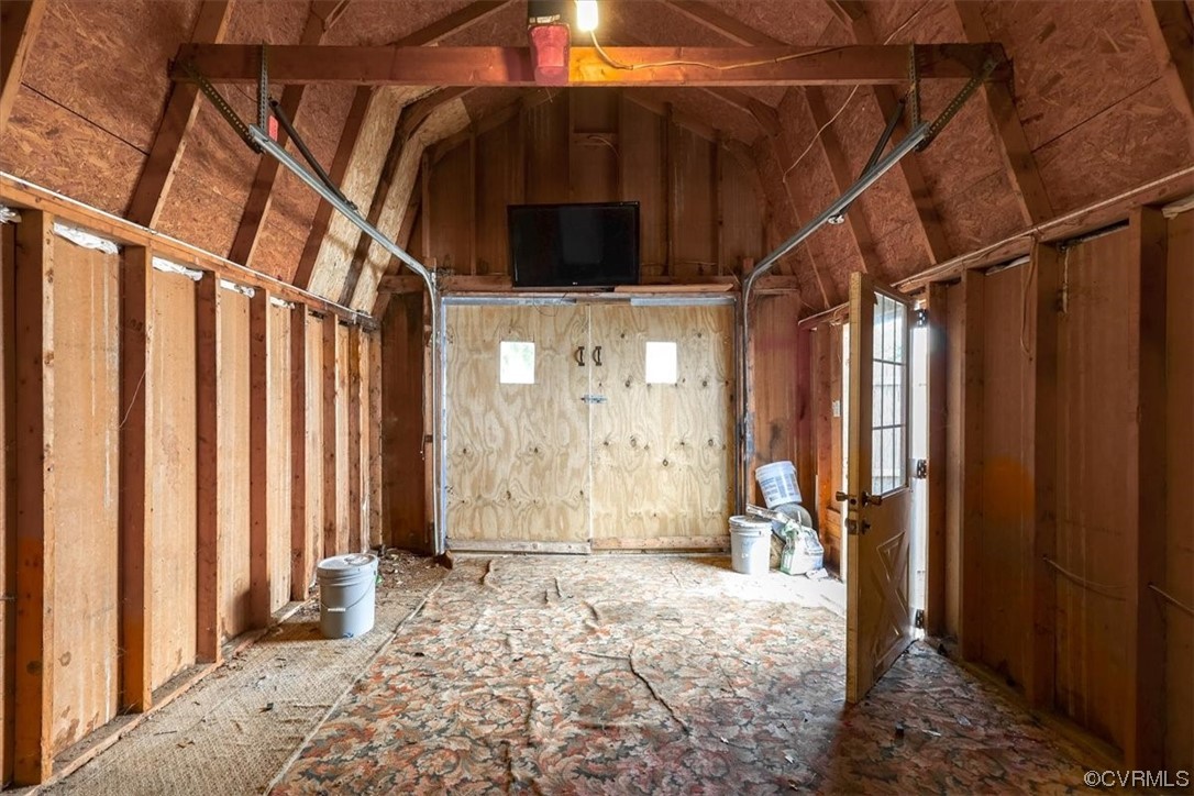 1006 Haskell Street Hopewell, VA 23860 - Photo 43 of 48 a view of an empty room with wooden floor and a window