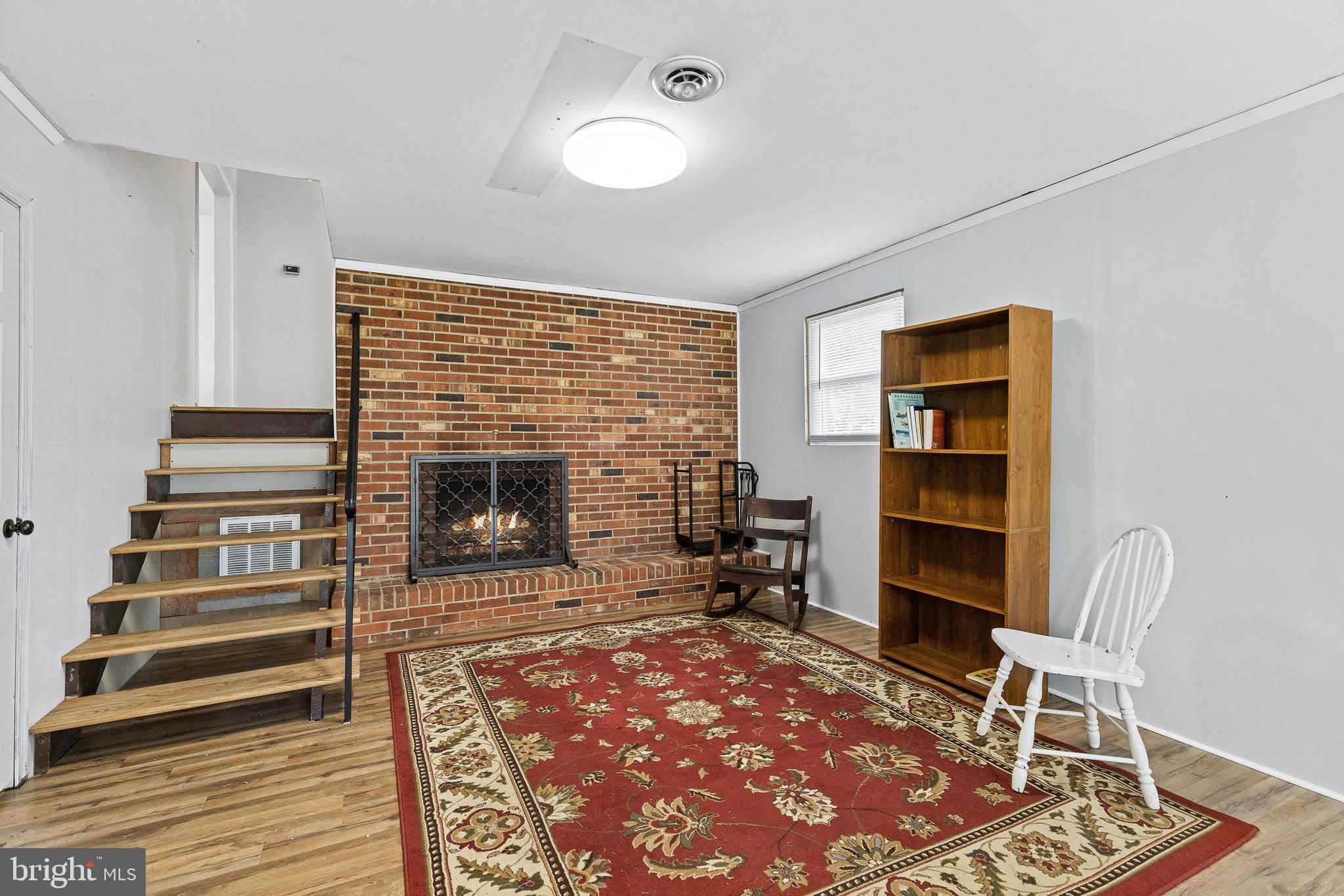 531 Cumberland Road Fredericksburg, VA 22405 - Photo 25 of 32 Lower level rec room with fireplace