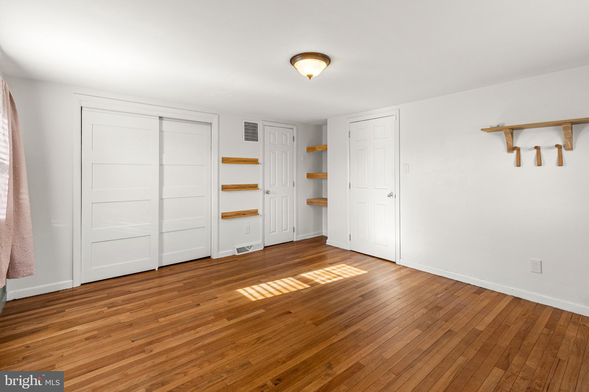 63 Quaker Hills Road Lancaster, PA 17603 - Photo 30 of 52 an empty room with wooden floor and closet
