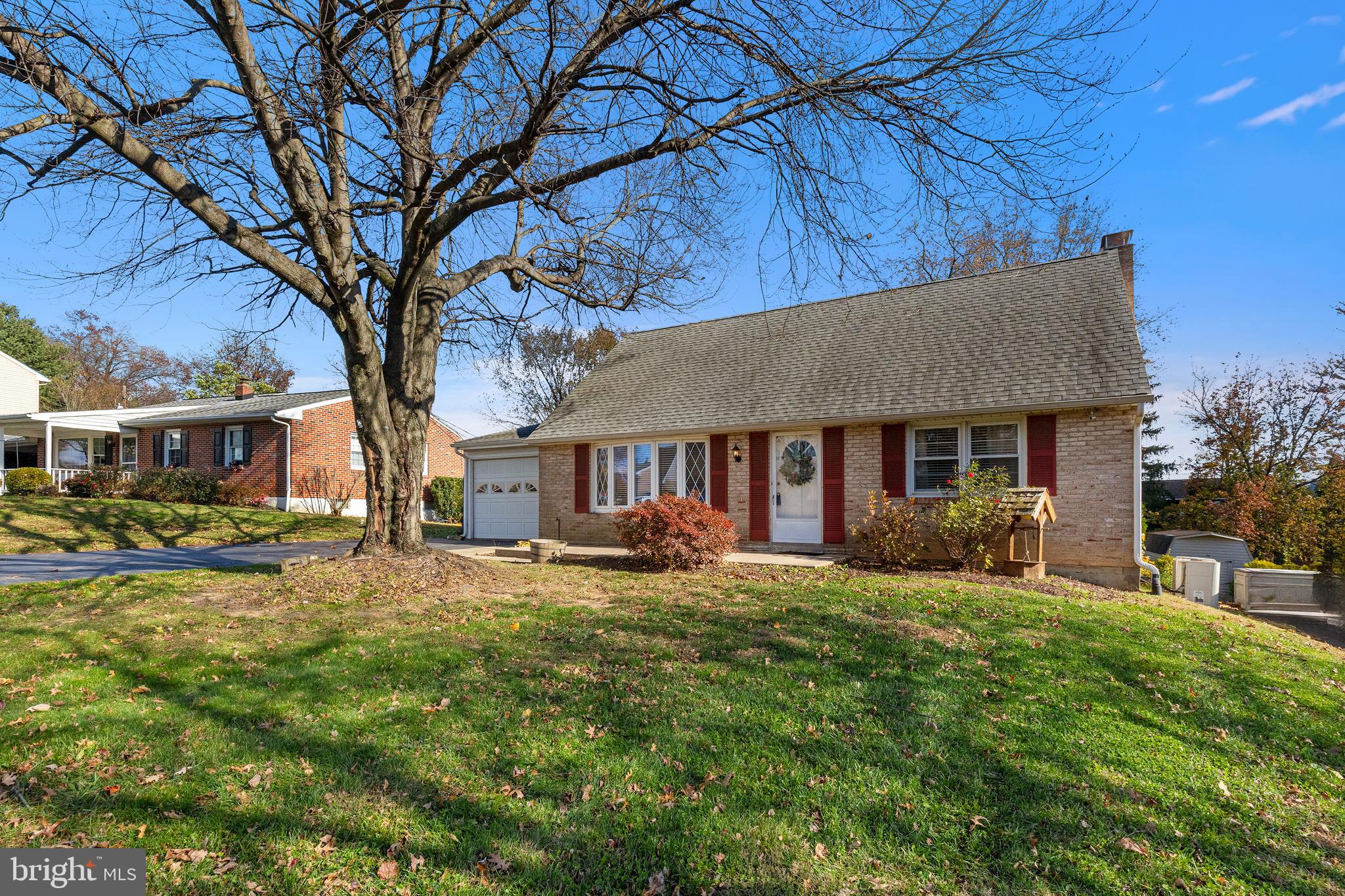 63 Quaker Hills Road Lancaster, PA 17603 - Photo 3 of 52 a view of a house with a yard