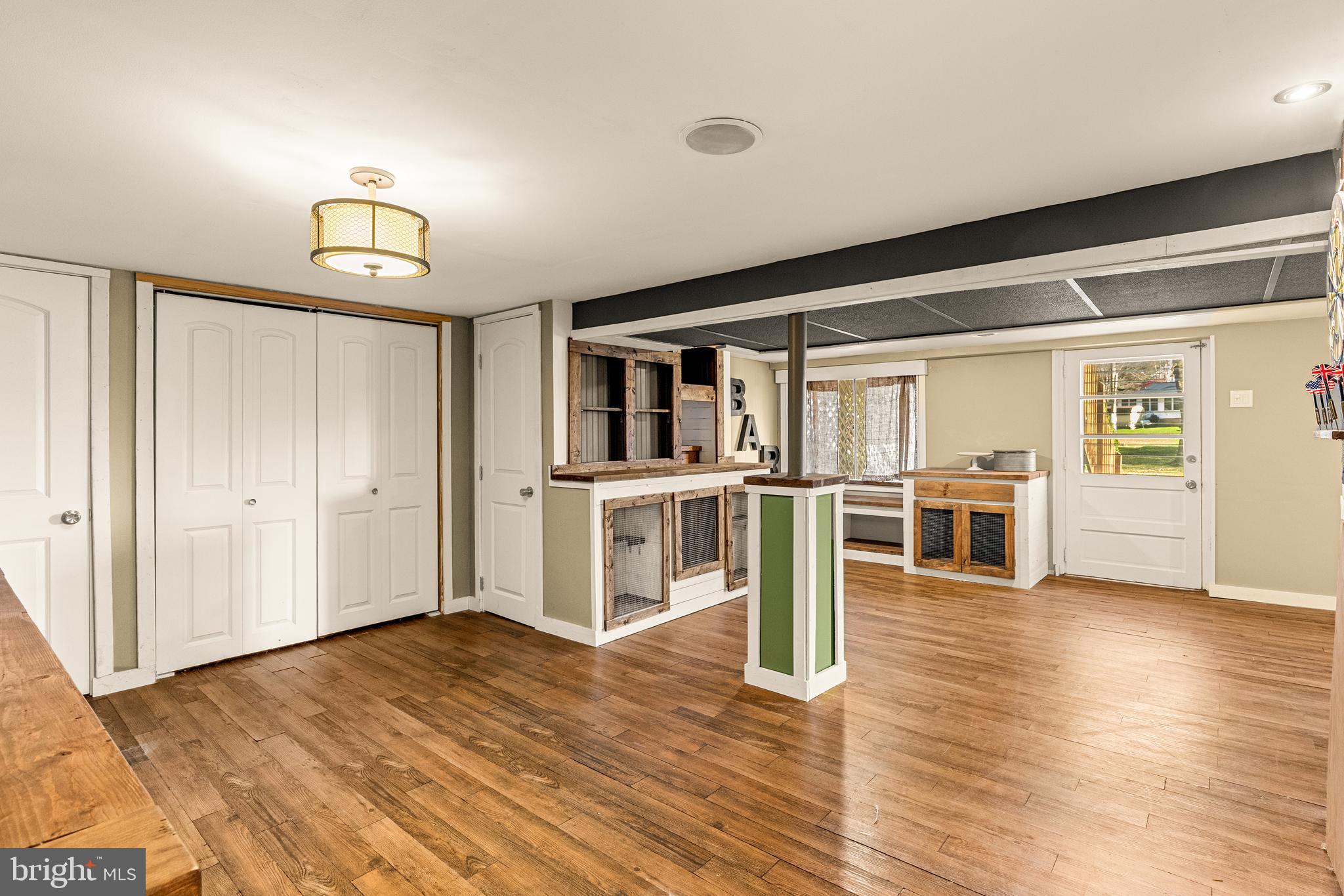 63 Quaker Hills Road Lancaster, PA 17603 - Photo 33 of 52 a view of a kitchen with wooden floor electronic appliances and windows