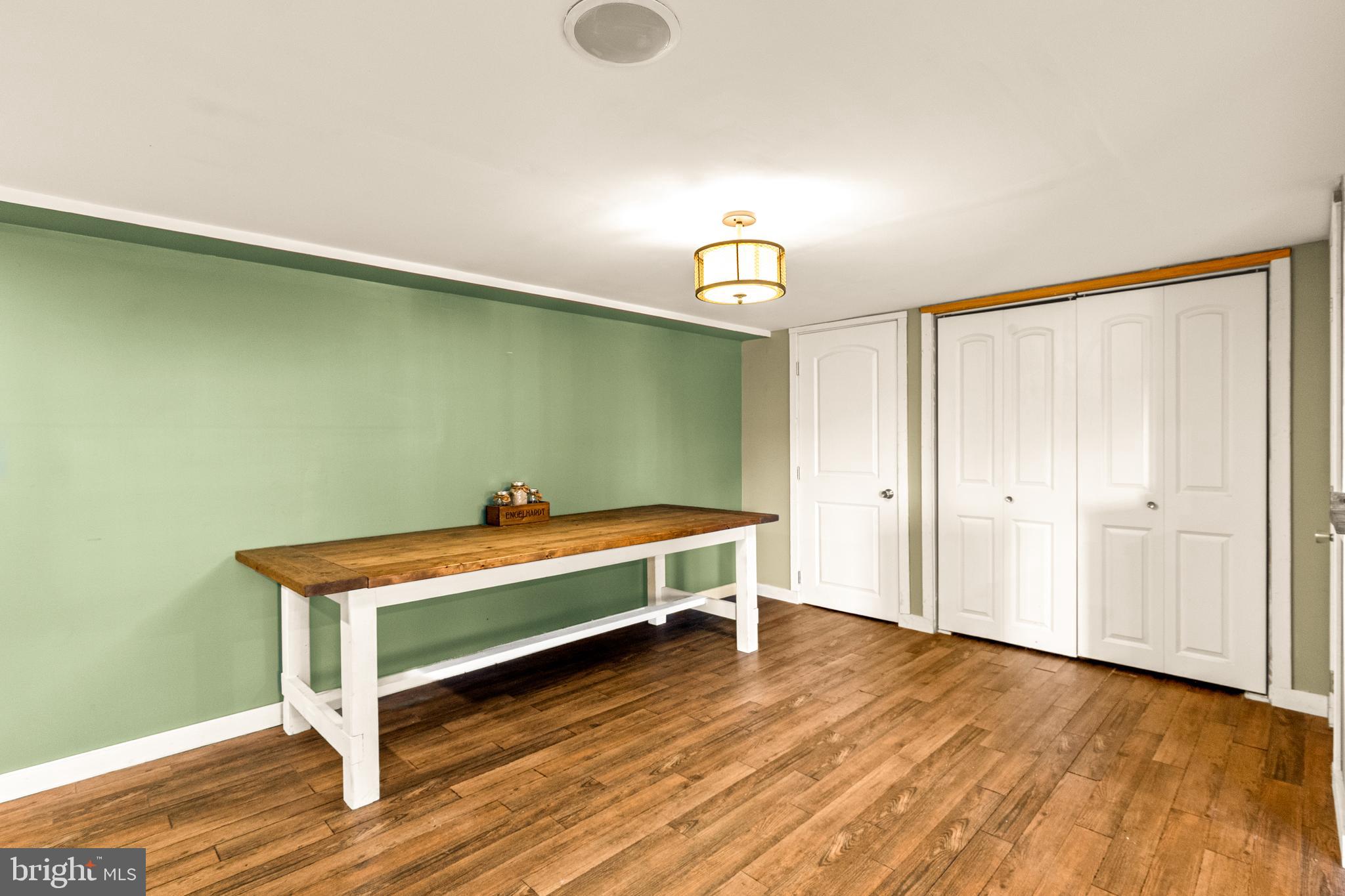 63 Quaker Hills Road Lancaster, PA 17603 - Photo 37 of 52 a room with a table and chandelier