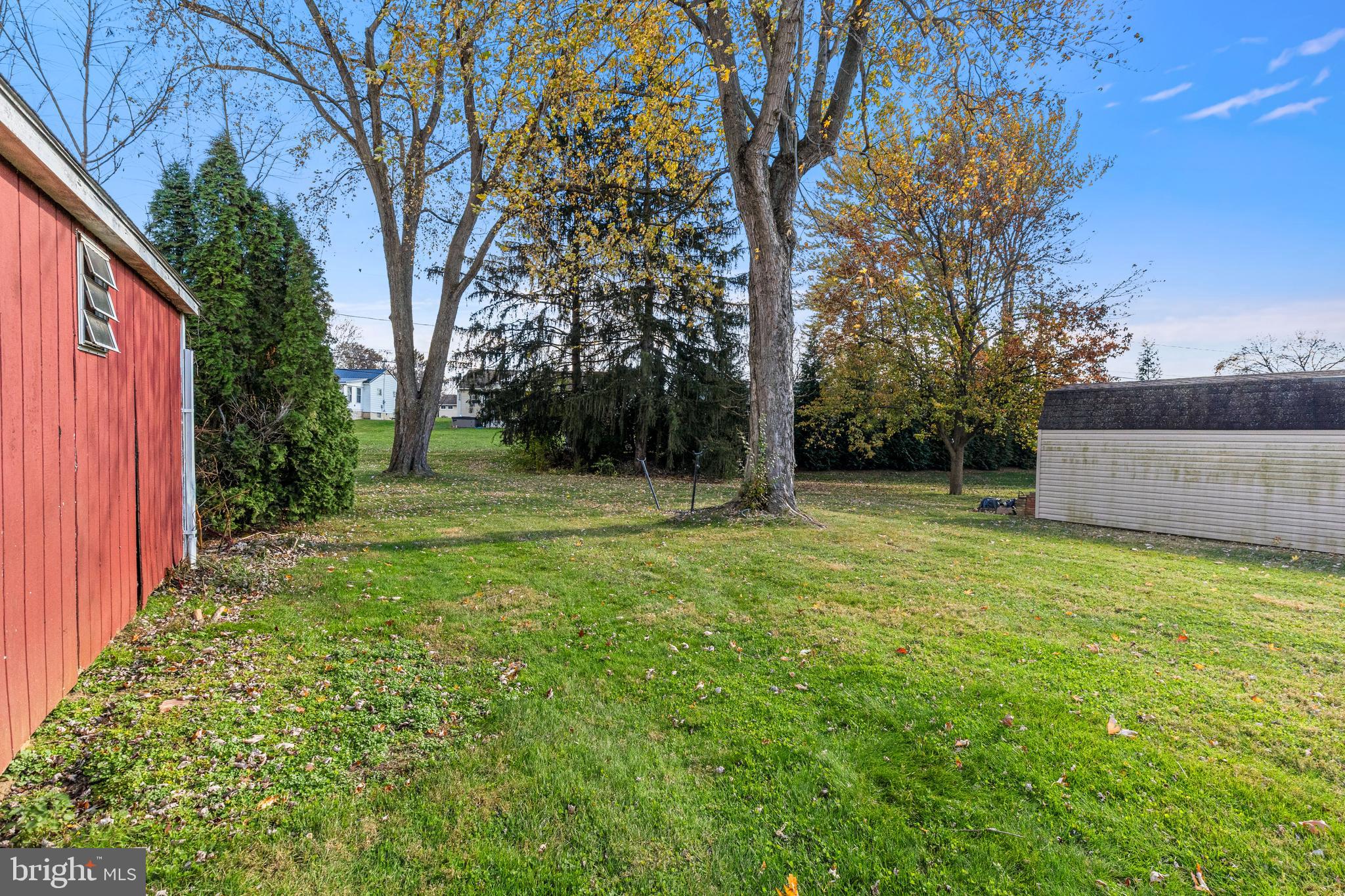 63 Quaker Hills Road Lancaster, PA 17603 - Photo 52 of 52 a backyard of a house with lots of green space