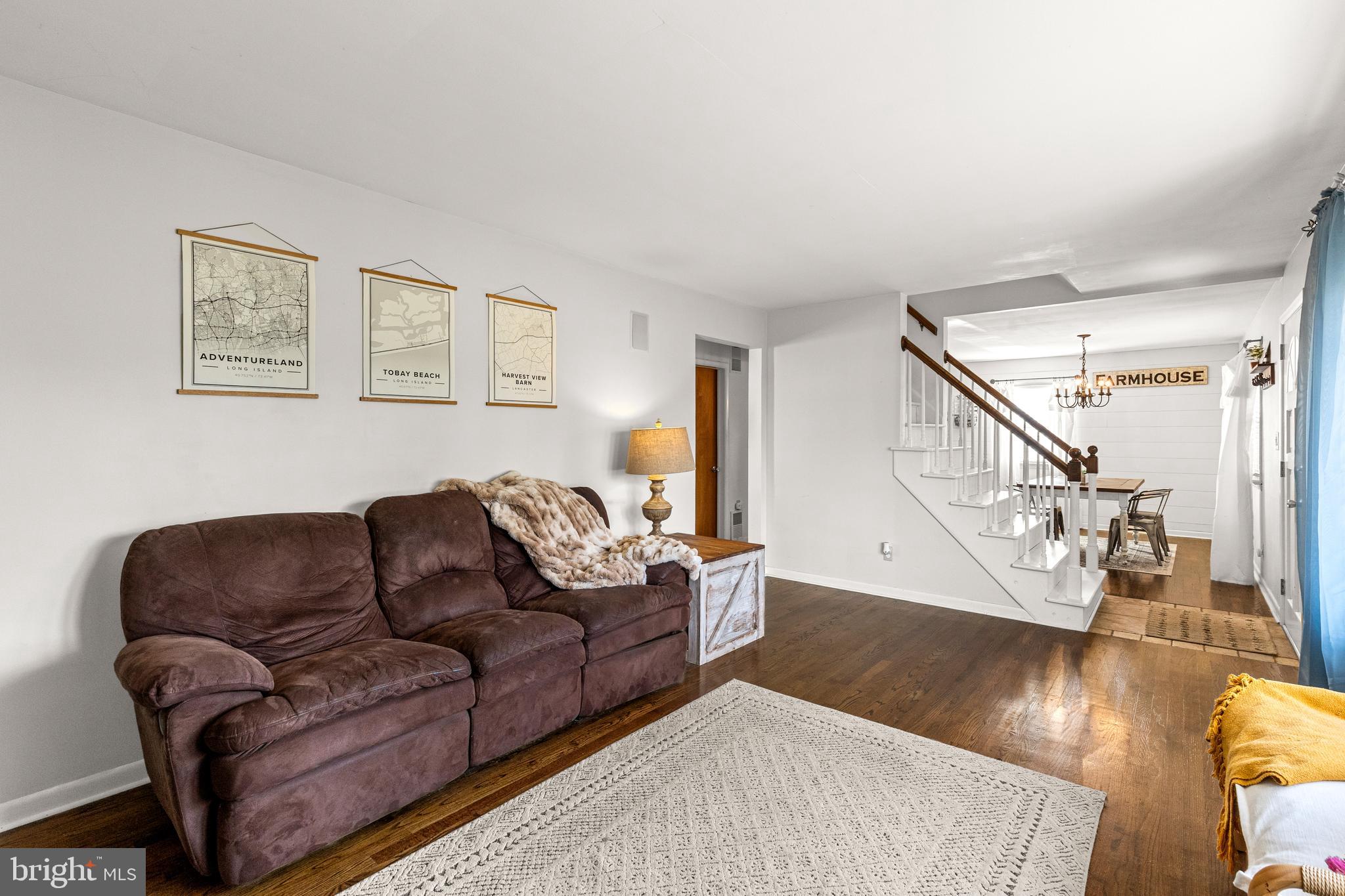 63 Quaker Hills Road Lancaster, PA 17603 - Photo 10 of 52 a living room with furniture and a hard wood floor