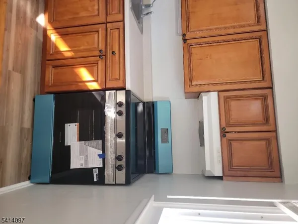 a view of a fireplace with a window