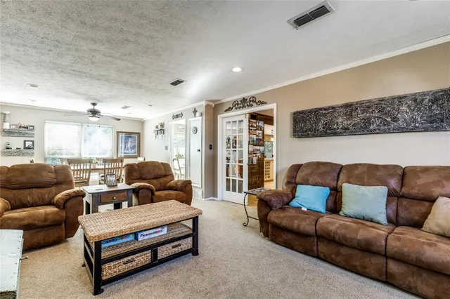 a living room with furniture and a couch